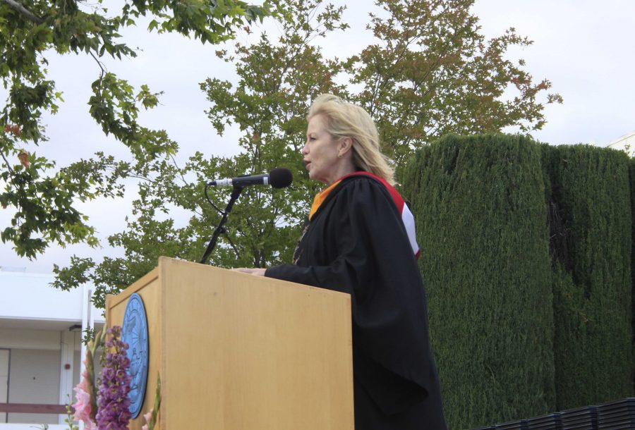 Trustee Dianne McKay gives a speech in the spring 2015 graduation. This years ceremony is expected to have 340 students attending. Photo credit: Agustin Garcia