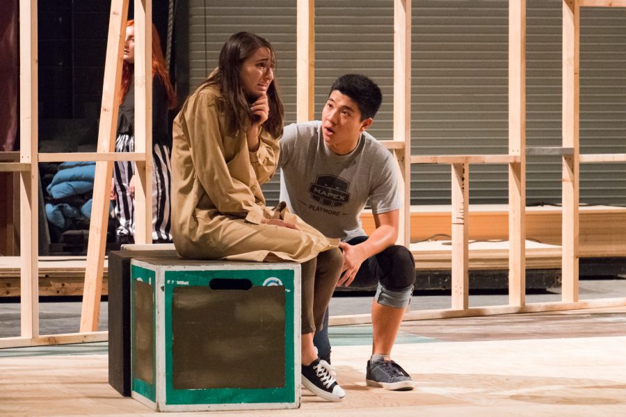 Eliana Rosen, 21, sits in fearful panic as Harry Cho, 18, attempts to calm her down during a rehearsal for Moorpark Colleges Night of the Living Dead theatrical production in the Performing Arts Center, Sept. 14. Rosen and Cho lead the 34-person cast for the play debuting on Oct. 13. Photo credit: Andrew Mason & Willem Schep