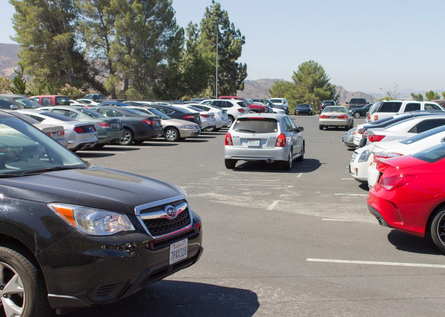 Students roam the academic center parking lot of Moorpark College in search of an open spot, Aug. 18, 2016. A lack of parking has proven itself a serious issue for new and returning students. Photo credit: Willem Schep