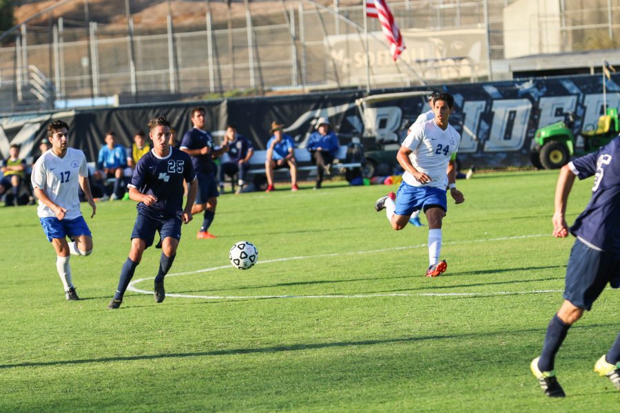 Raider Trent Madison moves up the field in the Western State Conference opener at Moorpark College against Santa Monica College Tuesday evening. Photo credit: Misha Goetze