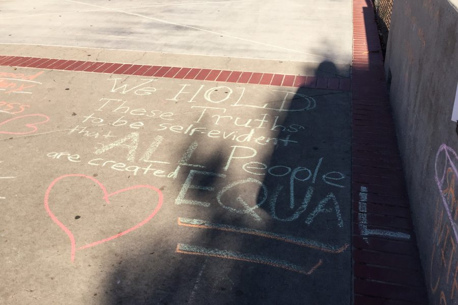 One+of+the+chalk+messages+covering+Raider+Walk+on+campus+on+the+morning+of+Nov.+22%2C+written+by+Seamus+McLean+and+his+friends.+Photo+credit%3A+Leslie+Kivett