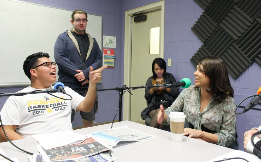 Student Voice member Francisco Molina, left, gets to know Writing Center tutor Angie Hoover at the StudentVoiceOnAir podcast recording Dec. 6. Hoover discussed tips on how to start a research paper and other writing tips with the StudentVoiceOnAir crew. Photo credit: Son Ly
