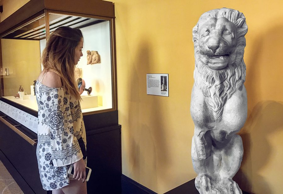 Shaylin Newhart, 21, views the Funerary Lion piece. Photo credit: Anissa Pillai