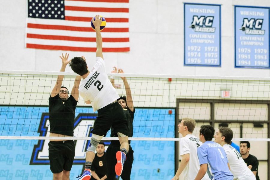 Outside hitter Spencer Gray spikes the ball to score a point for Moorpark. Photo credit: Jesse Watrous
