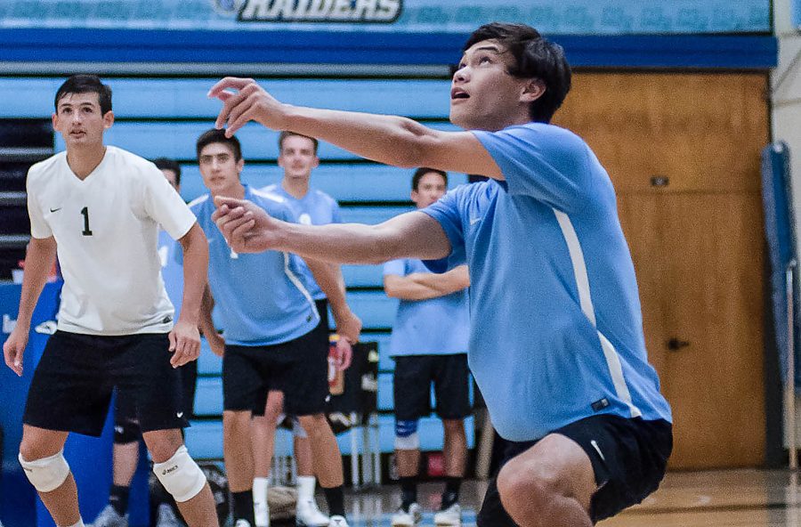 Spencer Grey of the Moorpark Raiders serves the ball in their match against Pierce College on March 24, 2017 at Moorpark College in Moorpark, Calif. Grey is the Raiders third best player with 82 kills, 74 digs, and 17 blocks. Photo credit: Amanda Cook