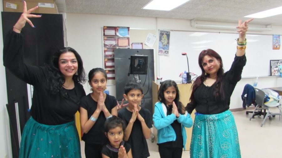 Monica Sarin poses with her fellow Bollywood dancer and their students, Tuesday, April 11, 2017 in Moorpark, Calif. Photo credit: Viviana Cardozo