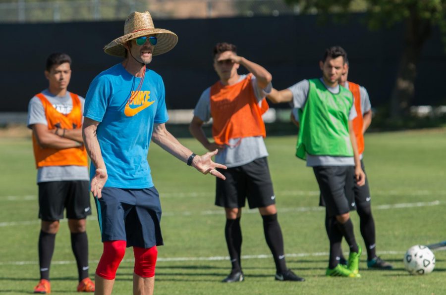 Moorpark College Men's Soccer head coach, Jake Gwin, gives instruction during Tuesday's practice.