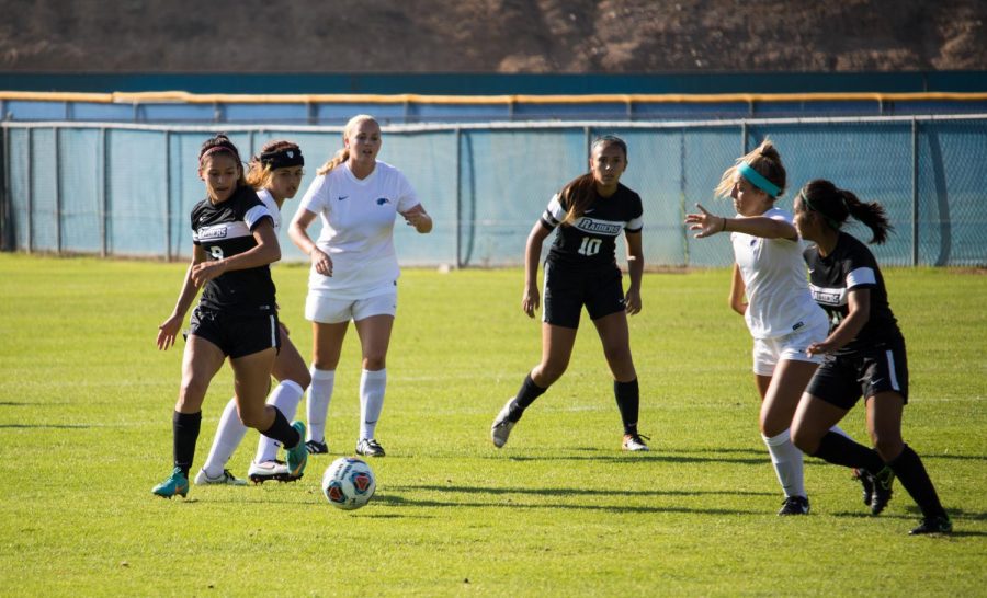 On Friday Sept. 9, players for Moorpark College and Santiago Canyon charge towards a loose ball. The Raiders lost 5-2 and now have a record of 1-4 entering conference play. Photo credit: Travis Bernard