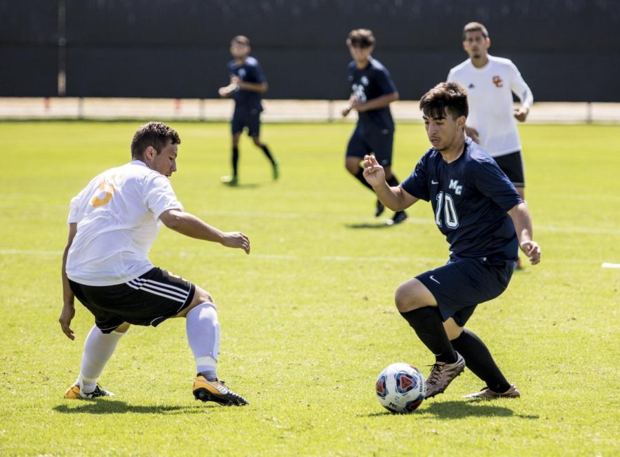 Attacking Midfielder Jonathan Ramirez (right) takes on a player from Glendale College (left).  The game was tied 3-3 in the second half and Ramirez scored the winning goal off of a penalty kick in the 87th minute. Photo credit: Julia Glass