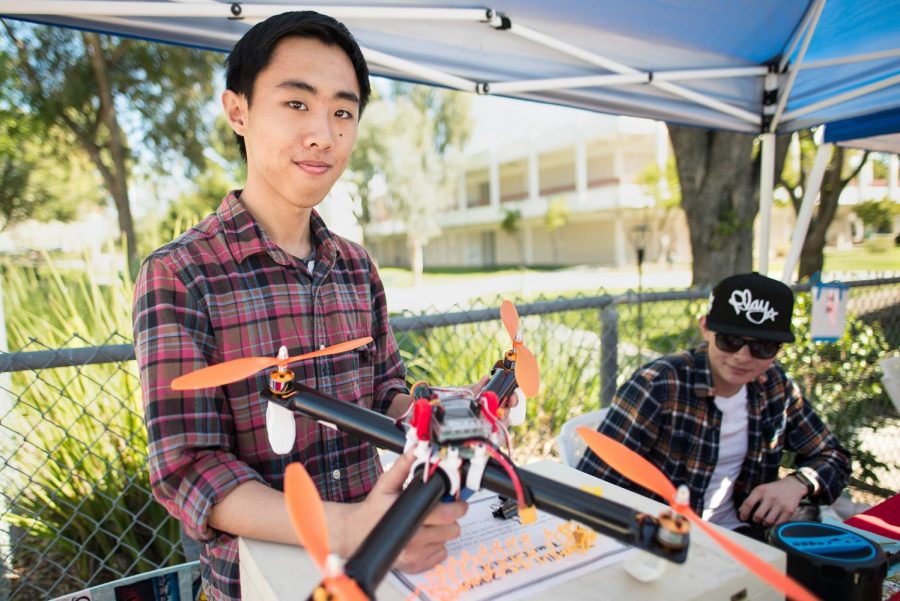 Calvin Tan, 20, holds a drone while promoting the Engineering Club Feb 14, 2017 Moorpark College Photo credit: James Schaap