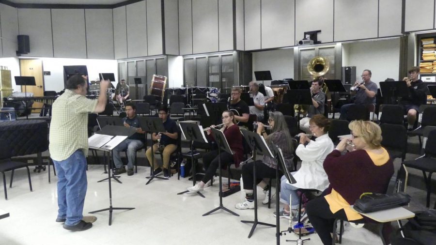 The Moorpark College Wind Ensemble plays their instruments in the orchestra room on Nov. 15, 2017. Moorpark College professor and wind ensemble music director Brendan McMullin conducts while the students rehearse for the upcoming Music for a Sunday Afternoon concert on Sun. Dec. 10, 2017. Photo credit: Ian Cohen