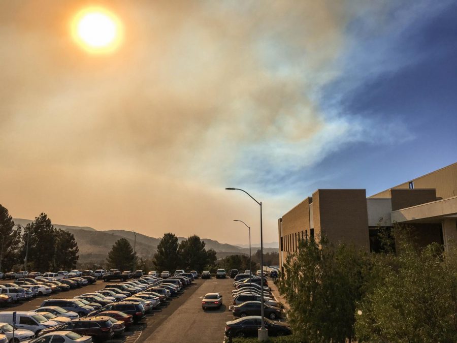 Smoke from the Rye Fire settles over the Academic Center at Moorpark College. The fire originates from Sylmar, which is approximately 30 miles east of the campus. Photo credit: James Schaap