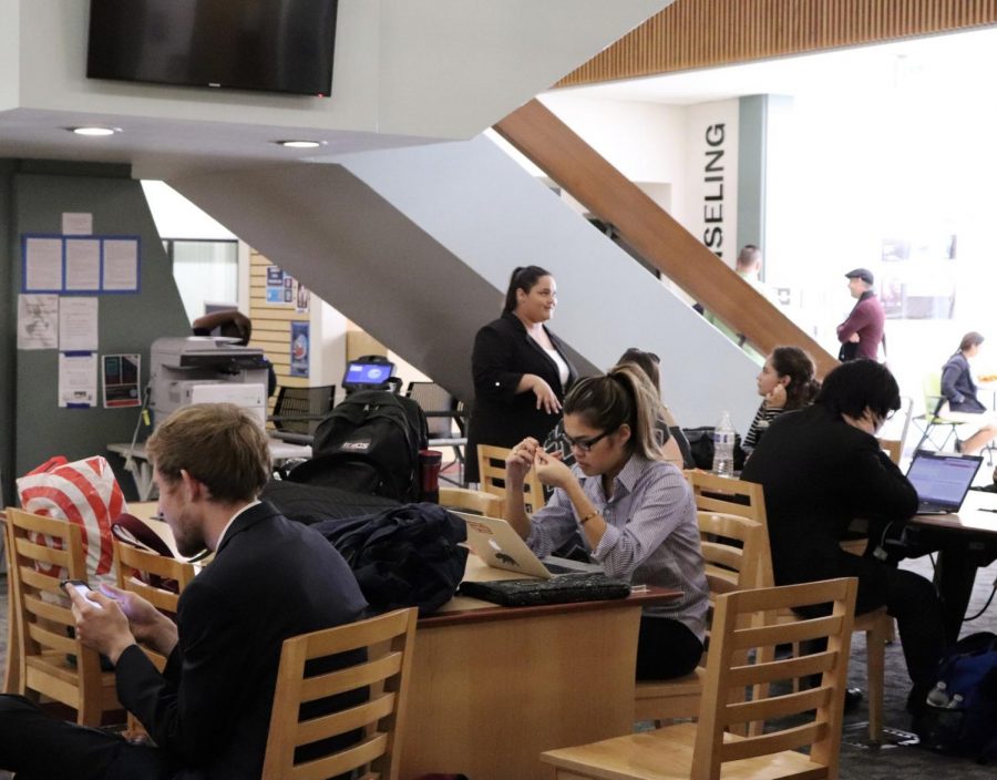 Students from schools stretching across the pacific southwest study in between competitions inside Fountain Hall. The Fall Championship is the final forensics tournament of the fall semester. Photo credit: Nicole Szczepanek