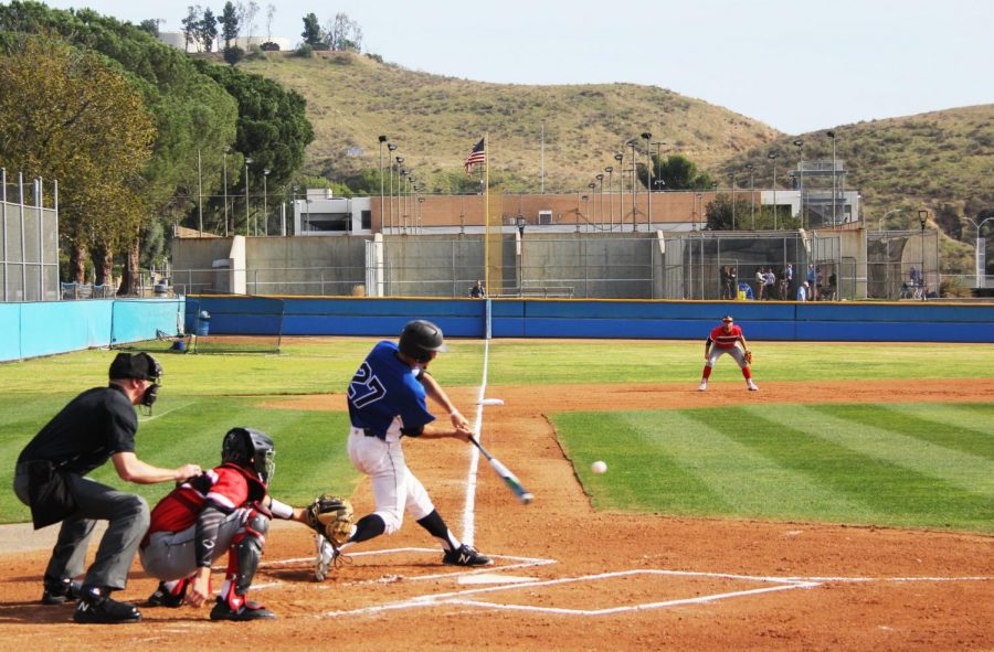 Sophomore%2C+Grant+Bunker%2C+hits+an+RBI+in+the+bottom+of+the+seventh+inning.+His+hit+gave+the+raiders+another+run.+Photo+credit%3A+Darya+Abbassi