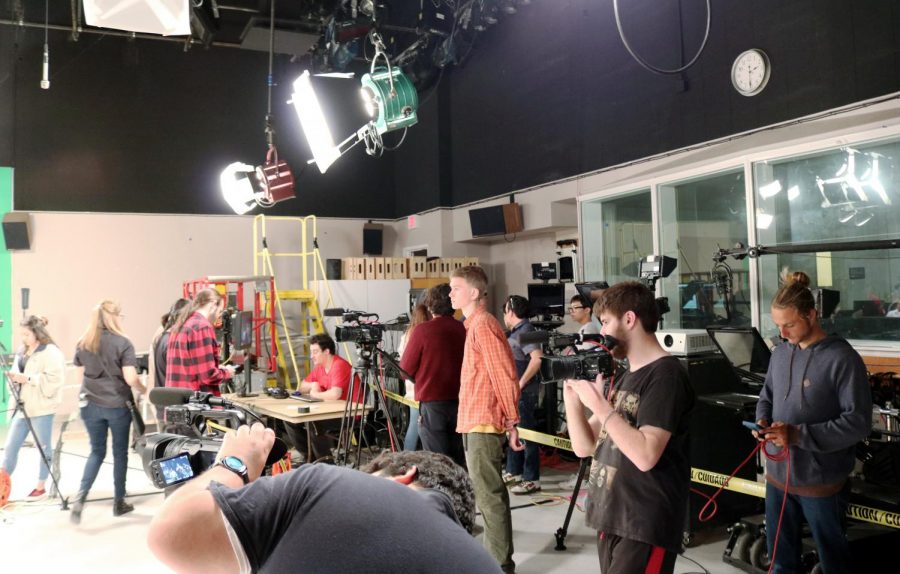 The FTVM production crew and reality production class ready equipment to film the auditions in the Communications building room 129, the TV studio. Photo credit: Kevin Bell