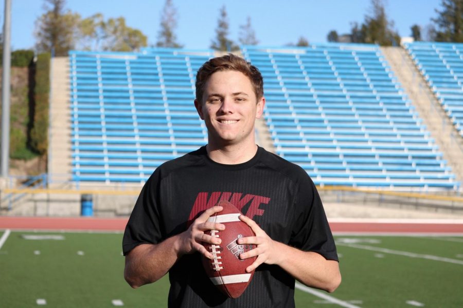 John Aloma, 19-year-old long snapper, stands on the Moorpark College football field. Aloma is heading to the University of California Davis in the fall. He has worked extremely hard to achieve his scholarship. Photo credit: Darya Abbassi