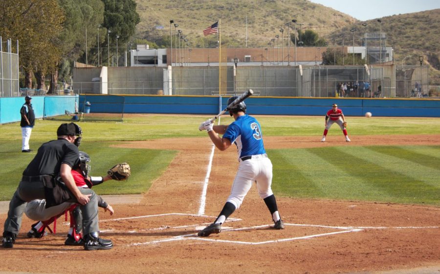 Freshman, James Terrazas, No. 3 infielder hits during their game against Pierce College in the beginning of their season. they started off their first home game with a win. Photo credit: Darya Abbassi