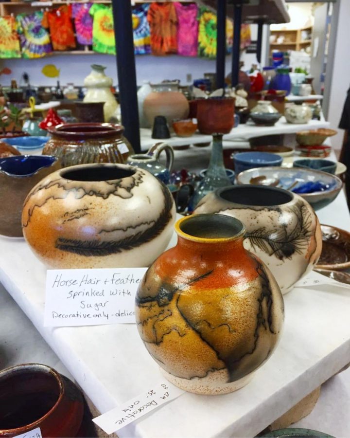 Tables and shelves are filled with student-made art for sale. The ceramic art sale is open May 2 and 3. Photo credit: Dallas Vorburger
