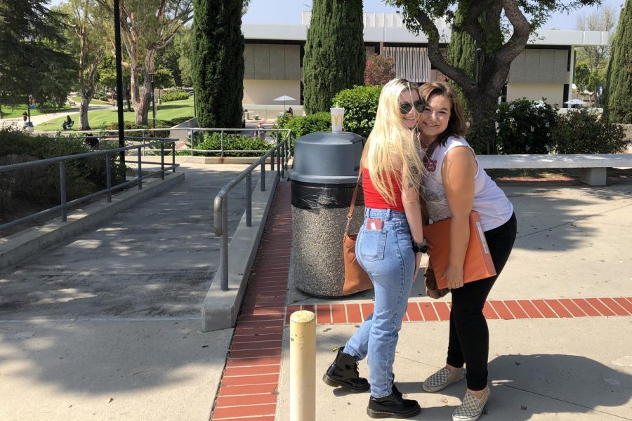 Ariana Romano, a nursing student, and her friend pose for a photo during the first week of classes. (Joseph Vergilis / Student Voice)