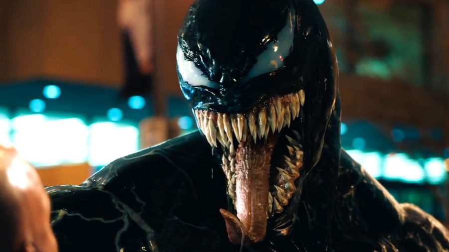 Venom, played by Tom Hardy, reveals himself. Image courtesy of Sony Pictures.