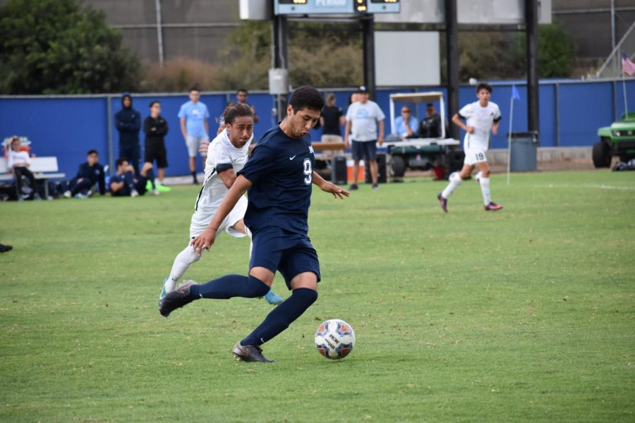 Angel Perez playing in his favorite position as a central midfielder. Photo credit: Perez Family