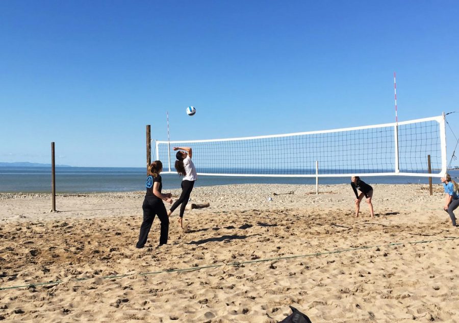 Elise+Beauvoir+sends+a+powerful+spike+back+over+the+net+to+Amanda+Romain+and+Cami+Beurer.+Stevens+rushes+to+her+partners+side+ready+to+assist+in+anyway.+Photo+credit%3A+Tessa+Sever
