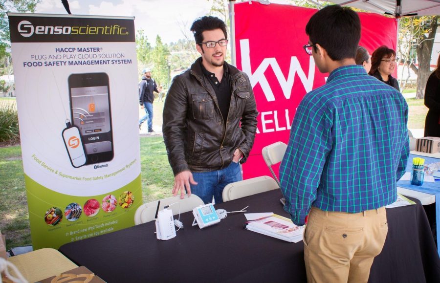 Mohit Sukhija (right), 18, talks Michael Black, 22, a quality manager from SensoScientific, at the Career and Intership Expo on campus in Moorpark, Calif. on Wednesday, March 14, 2018. Many companies like SensoScientific are searching for innovative minds at Moorpark College. Photo credit: Evan Reinhardt