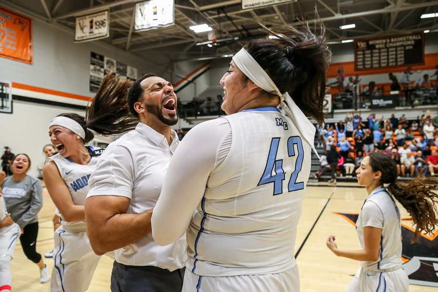 Head Coach Kenny Plummer celebrates with Sophomore Barbara Rangel after Moorpark defeated Merced College, 73 -68, at Ventura College on Saturday, March 16, 2019, advancing to the CCCAA Womens Basketball State Final for the first time in school history.  Photo Credit: Jace Kessler