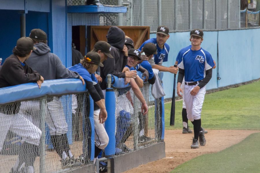 The+Moorpark+College+baseball+team+talk+with+one+another+during+their+game+against+Fullerton+City+College+at+Moorpark+College%2C+CA%2C+on+Tuesday%2C+April+16th%2C+2019.+Photo+credit%3A+Caitlin+Mchale