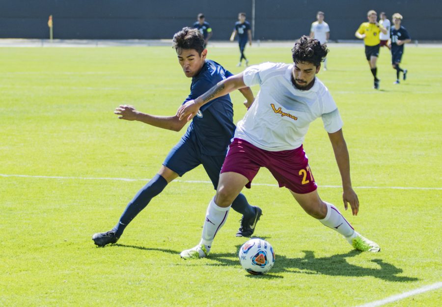 Raiders+forward+Bryan+Ramos+is+boxed+out+by+Vaqueros+defender+Ricky+Morales+during+Moorparks+match+against+Glendale+Community+College+on+Tuesday%2C+Sept.+24.+The+Raiders+loss+puts+their+record+at+2-4.+Photo+credit%3A+Evan+Reinhardt