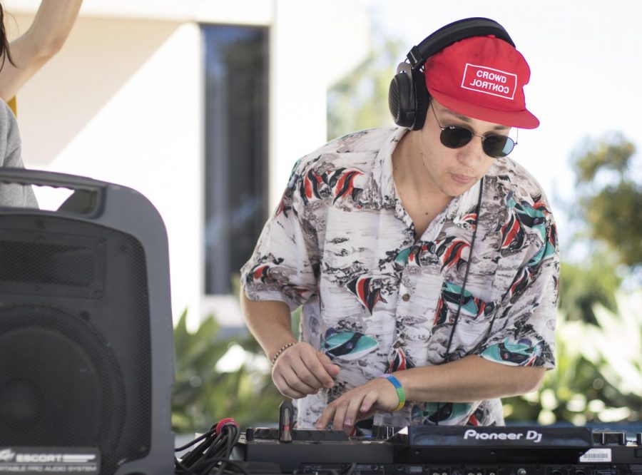 Carter Kanes creates some beats during the DJ performance on Raider Walk, on Thursday, Oct. 24. Kanes will be performing at the DJ Showcase on Friday, Oct. 25. Photo credit: Evan Reinhardt