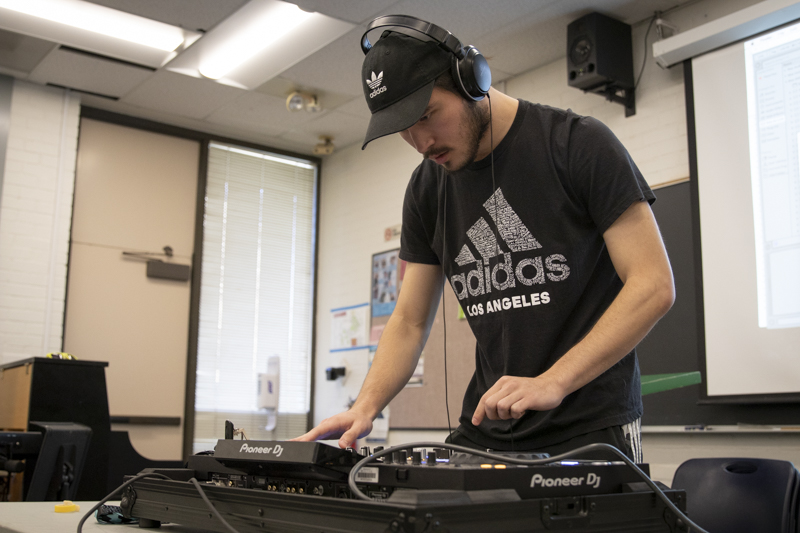 Trevor Stolz, Moorpark business student, performs his set demo during practice for the showcase on Thursday, Jan. 23, in the HSS building. Stolz is a second year student at Moorpark College. Photo credit: Evan Reinhardt