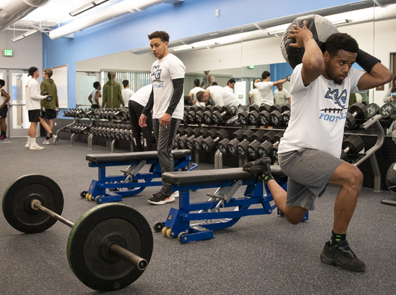 Kenny Stewart works out with the rest of the Moorpark football team in the newly renovated section of the gym on Thursday, Jan. 16. Photo credit: Evan Reinhardt