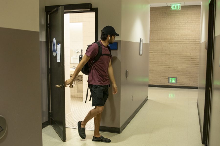 Carter Bell, Moorpark student, leaves one of the gender neutral bathrooms in the AC building, on Thursday, Feb. 13. According to Carter, bathrooms should be a place of privacy and safety, not awkwardness and fear. Photo credit: Evan Reinhardt