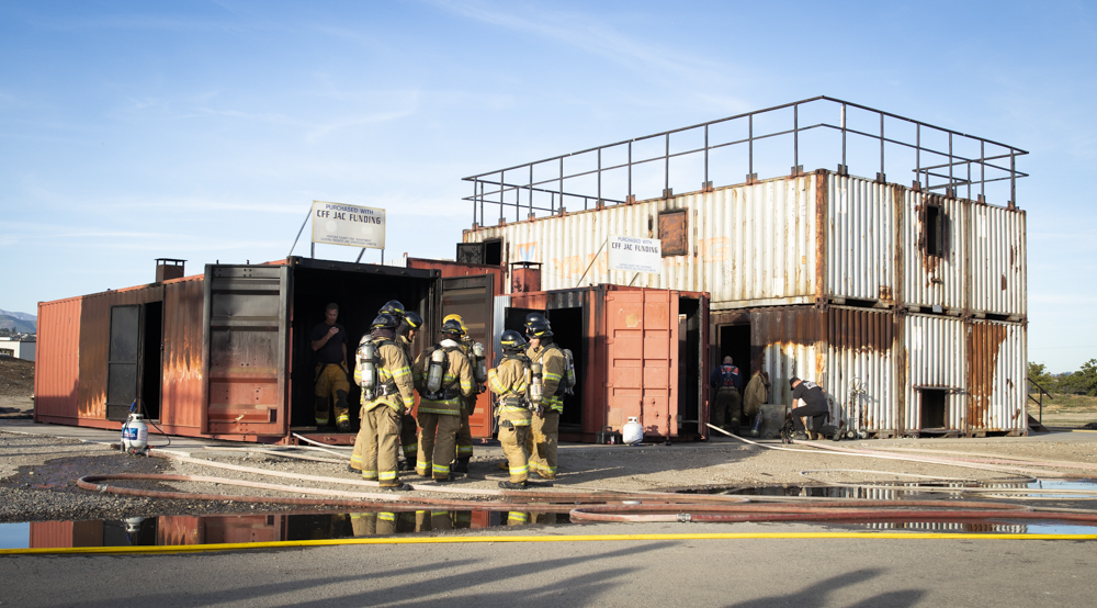 Oxnard College Fire Technology students prepare to begin a live fire training session on Wednesday, Feb. 26, adjacent to the Camarillo Airport, in Camarillo, Calif. The cadets witnessed the behavior of fire when introduced to oxygen in an enclosed structure.