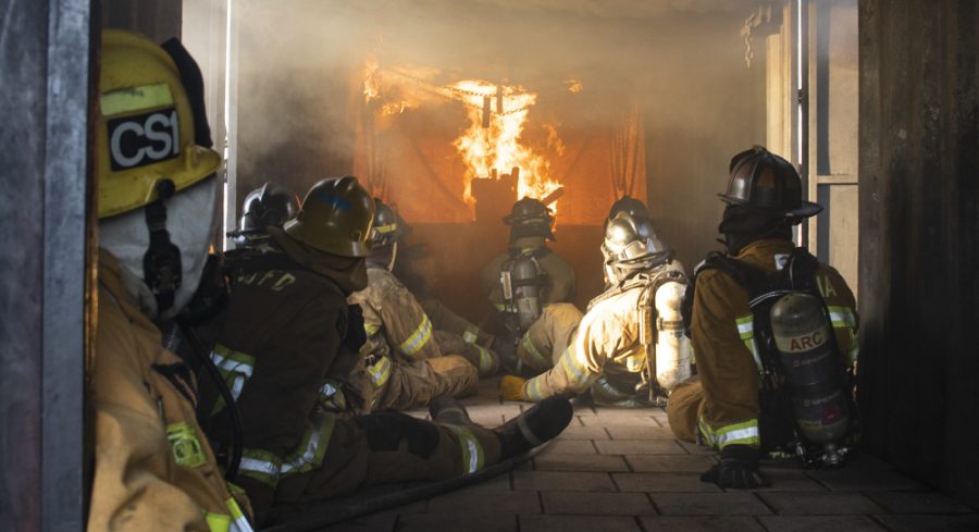 Oxnard College Fire Technology cadets participate in an indoor structure fire training session on Wednesday, Feb. 26, adjacent to the college building at the Camarillo Airport in Camarillo, Calif. The training exercise was meant to show the students how fire is fueled in an enclosed structure. Photo credit: Evan Reinhardt