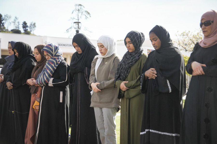 Members of the Moorpark College Muslim Student Association stand for the Jumuah prayer on campus on Friday, Jan. 31. The sermon and prayer is the final celebration for Islam Awareness Week. Photo credit: Morgan Ellis
