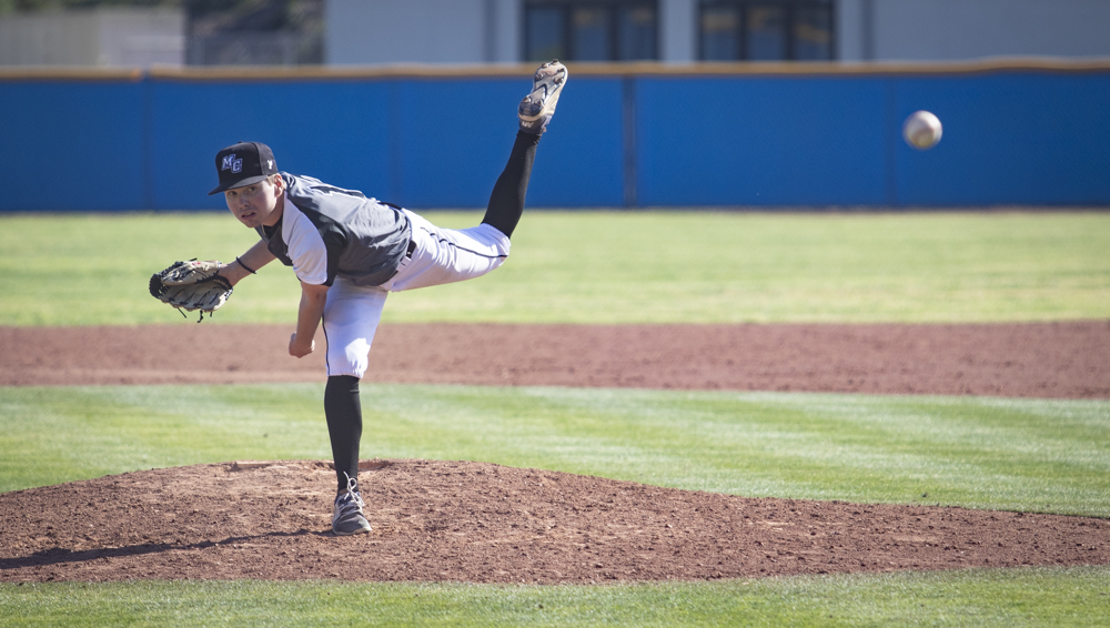 Freshman Carson Stanfield launches a pitch during the Raiders' game against the Pierce College Matadors on Saturday, Feb. 29. Stanfield closed out the game for the Raiders on the mound.