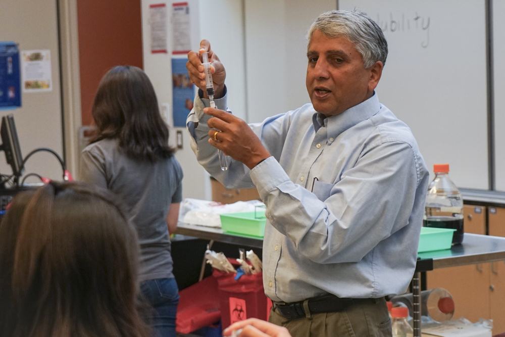 Subhash Karkare, professor of biotechnology/biology at Moorpark College, leads a workshop on biotechnology during Middle School Health Careers Day at Moorpark College Wednesday, March 4.