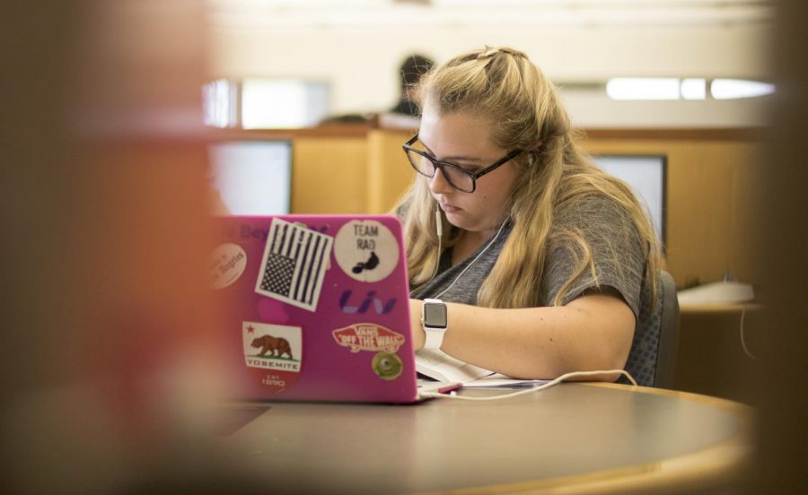 Emmerson Kelly, Moorpark student, uses her laptop to study for her english class in the top floor of the library on Wednesday, Oct. 16, 2019. Although making the switch to online classes may be tough for some students, Kelly says that taking online classes has allowed her to do classwork when it is most convenient. Photo credit: Evan Reinhardt