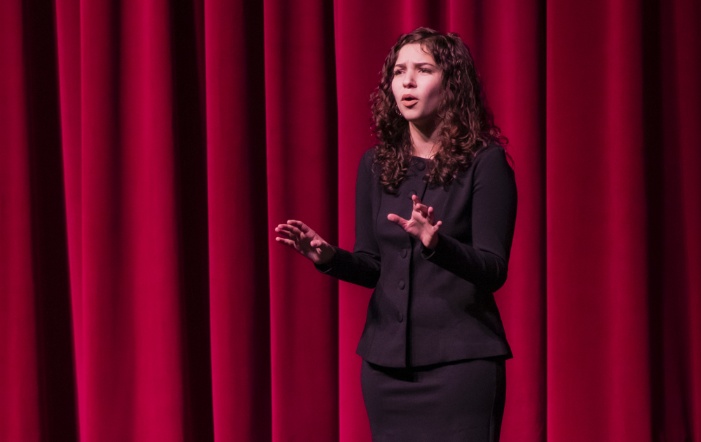 Riley Shapiro performs her persuasive speech during the Forensics Showcase on Tuesday, Dec. 10 in the Performing Arts Center. Shapiro spoke about the rampant culture of sexual assault within law enforcement in the U.S.