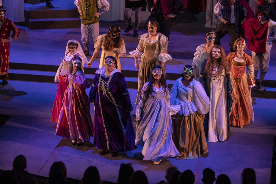 The cast of Romeo and Juliet perform the scene where Romeo meets Juliet for the first time, on Tuesday, March 12, in the performing arts building. Photo credit: Evan Reinhardt