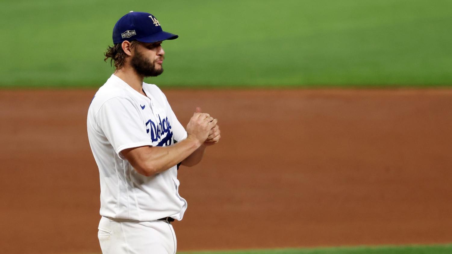 Clayton Kershaw of the Los Angeles Dodgers reacts during the fourth inning against the San Diego Padres in Game Two of the National League Division Series at Globe Life Field on October 07, 2020 in Arlington, Texas. (Tom Pennington/Getty Images)