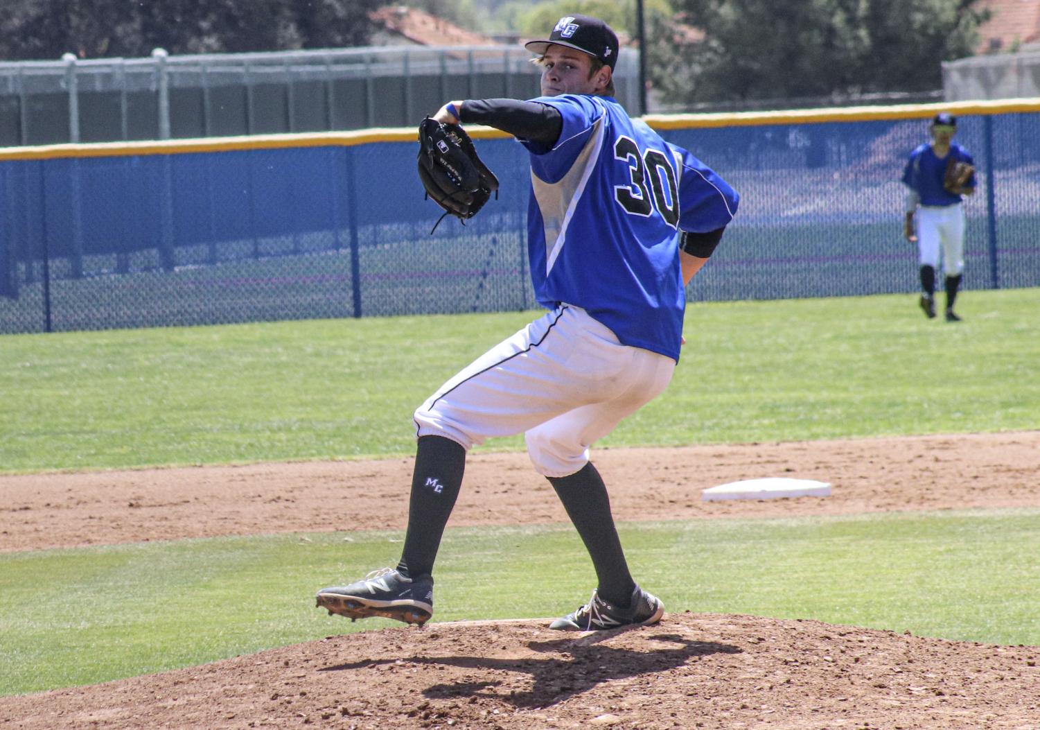 Freshman pitcher Garret Yawn winds up in his first start for the Moorpark Raiders against the Ventura Pirates on April 15. Yawn finished with two earned runs in four innings of play.