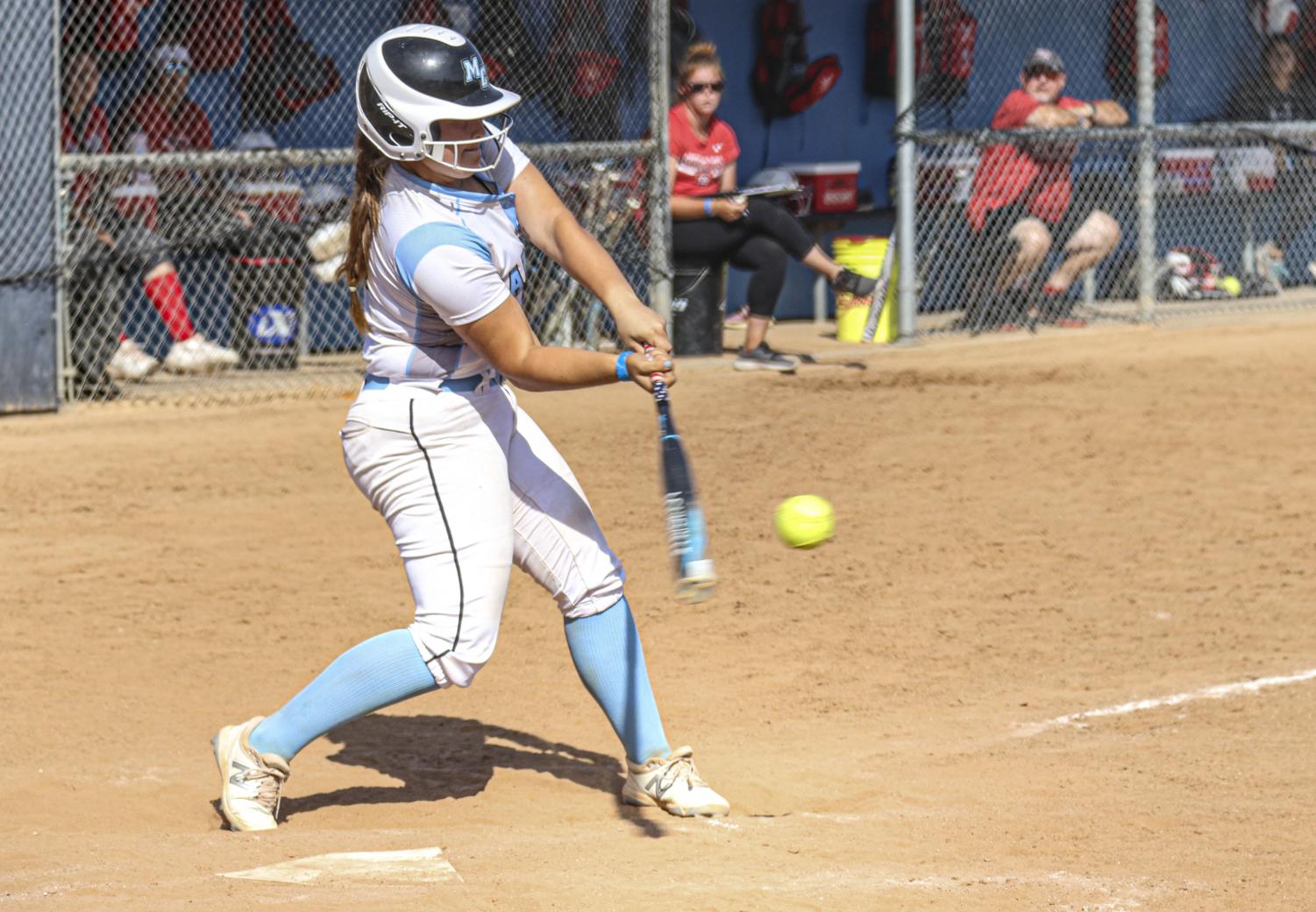 First baseman Ylse Prieto makes contact with a pitch during Moorpark's second home game of a doubleheader versus Bakersfield College on Saturday, May 8, 2021.