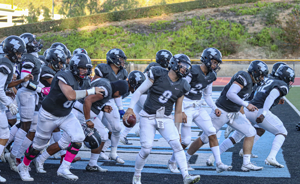 The Raiders march onto the field before the start of the game against Mt. San Jacinto on Saturday, Oct. 9 in Moorpark, California.