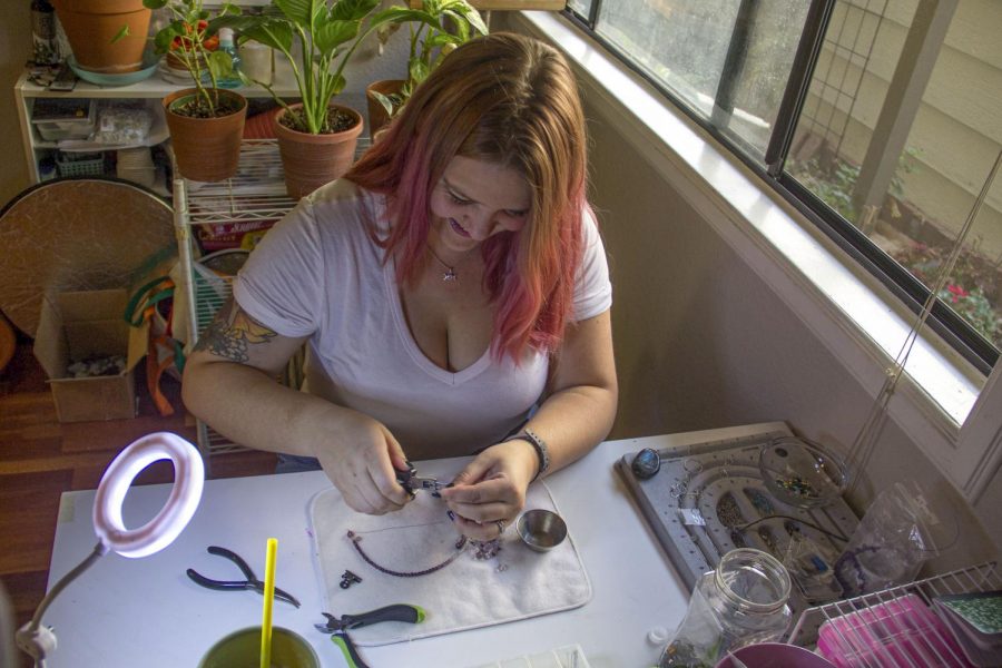 Former Moorpark student Alissa Goldberg works on her hand made sustainable jewelry at her apartment in Thousand Oaks on Monday, Nov. 15. Photo credit: Ali Wire