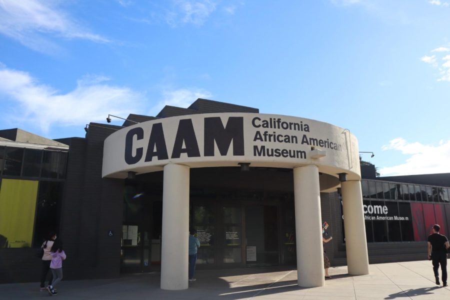 Visitors walk towards the entrance of the California African American Museum on Jan. 16, 2022. CAAM is offering a series of virtual programs on Martin Luther King Jr. Day to commemorate King's life and legacy. Photo credit: Shahbano Raza