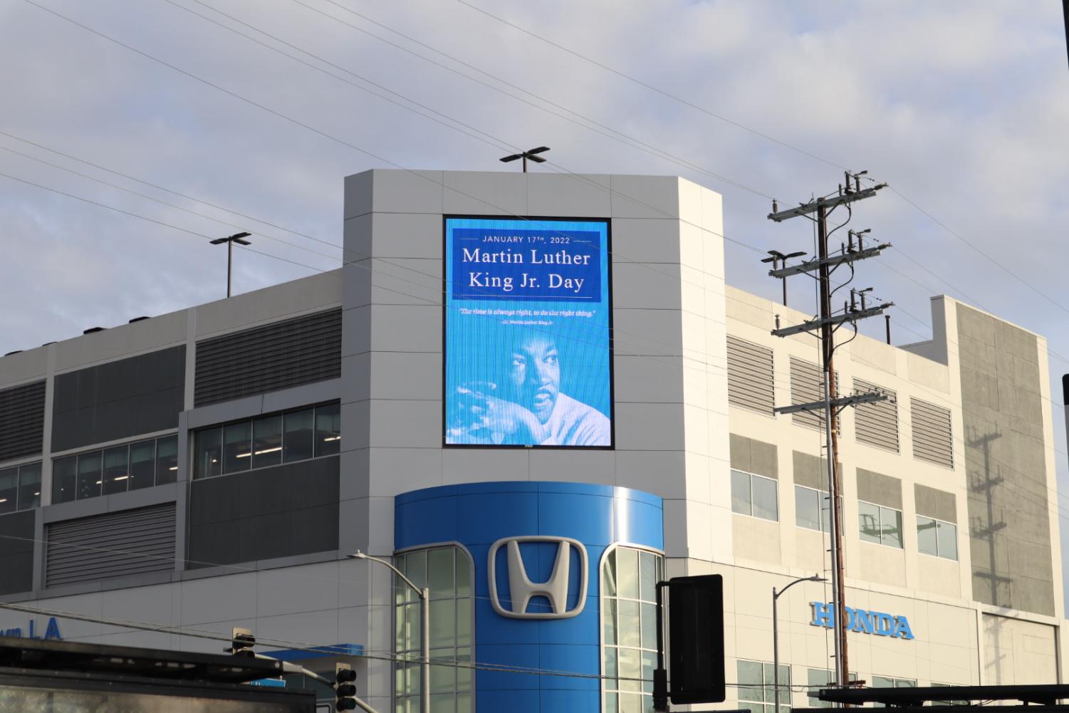 A virtual sign commemorates Martin Luther King Jr. Day on King Boulevard in Los Angeles, CA on Jan. 16, 2022. The sign contains a well known quote from King: "The time is always right, to do the right thing."