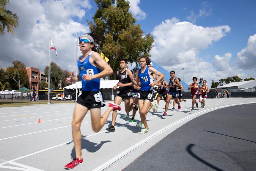 Moorpark Colleges Marcus Fehlman (left) and Bryce Gardhouse (right) lead the way in the mens 1500 run at the track and field Beach Opener in Long Beach, CA, on Friday, March 4, 2022. Photo credit: Christopher Schmider